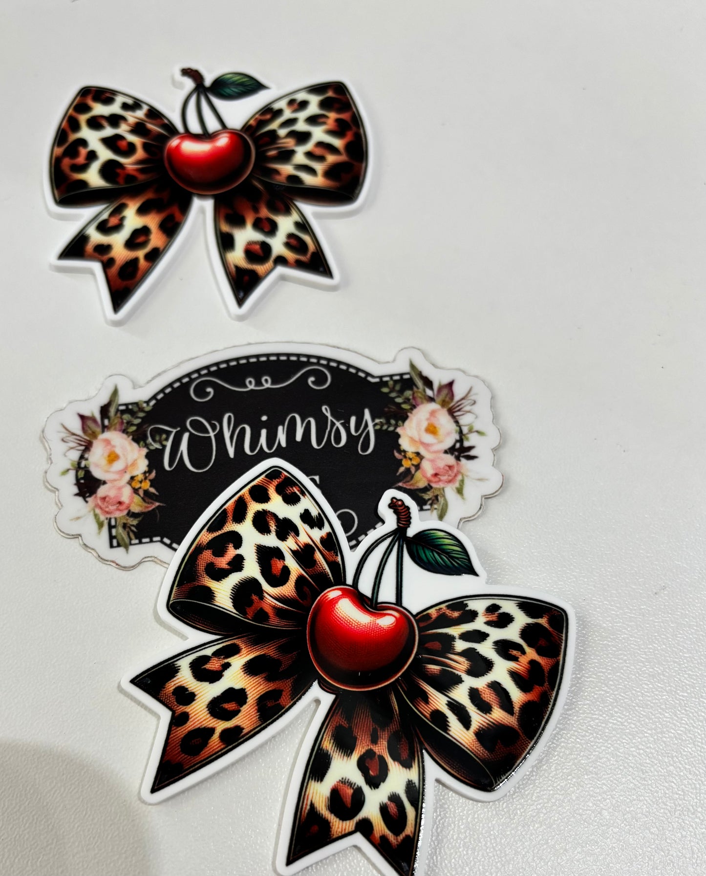 LEOPARD BOW W CHERRIES LARGE RESIN -