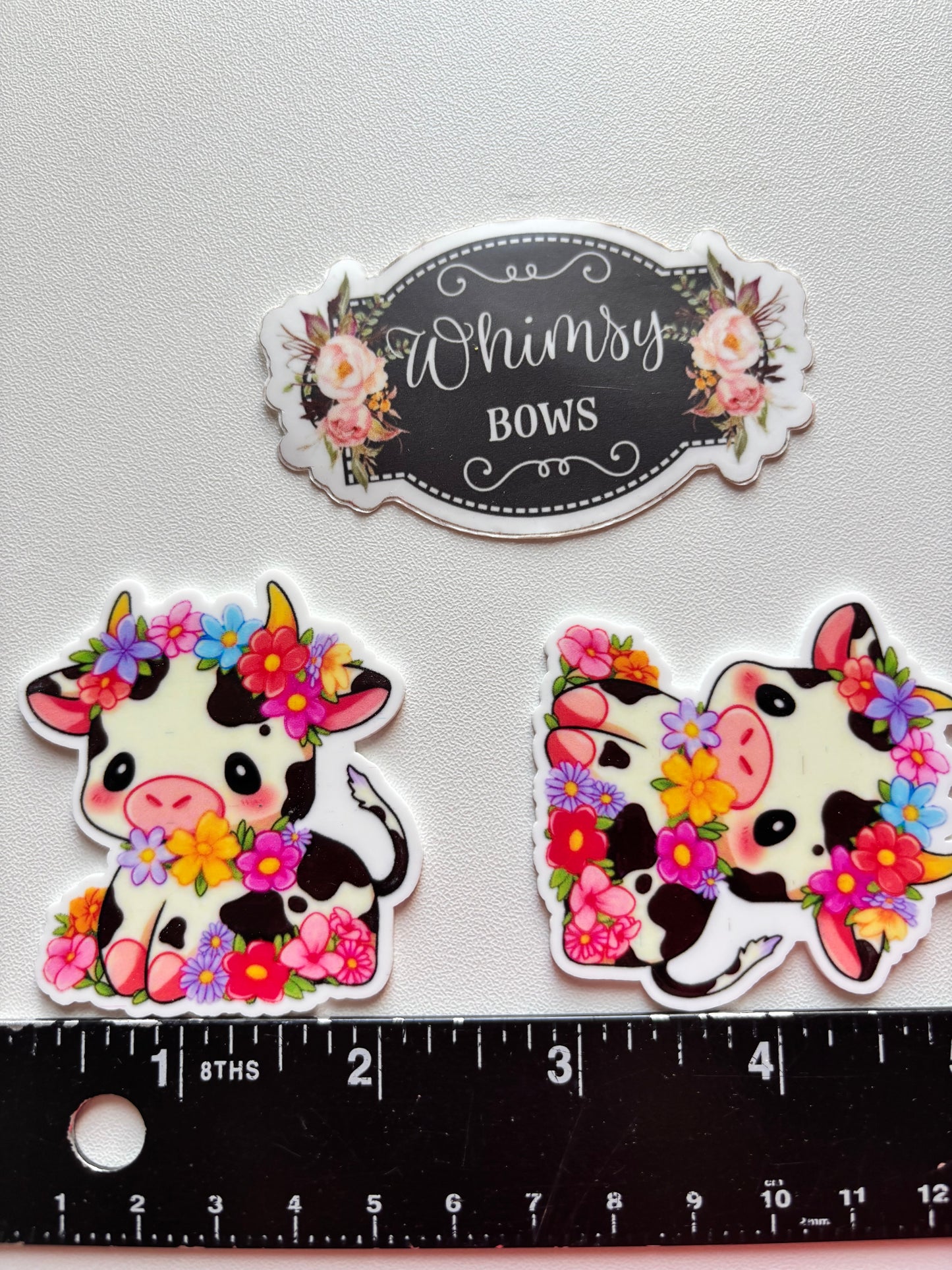 COW W FLOWERS LARGE RESIN