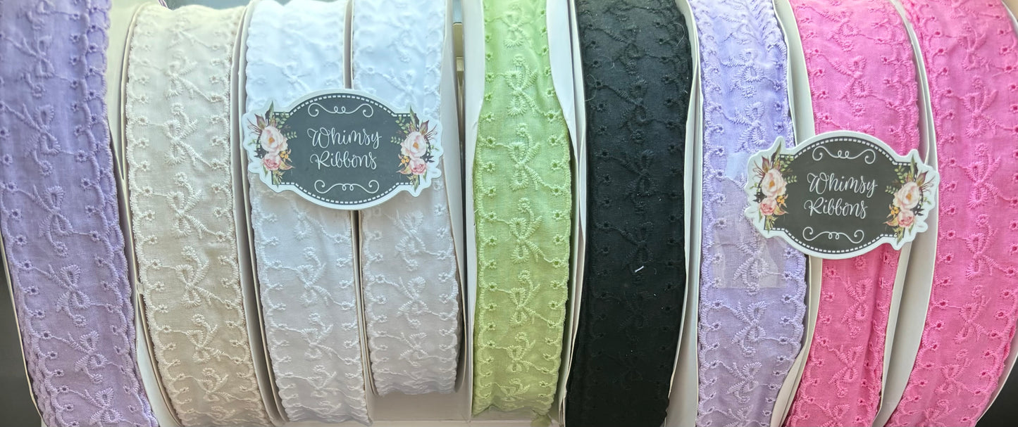 1.5 INCH APPLE GREEN BOWS ON EYELET MATERIAL -1YARD