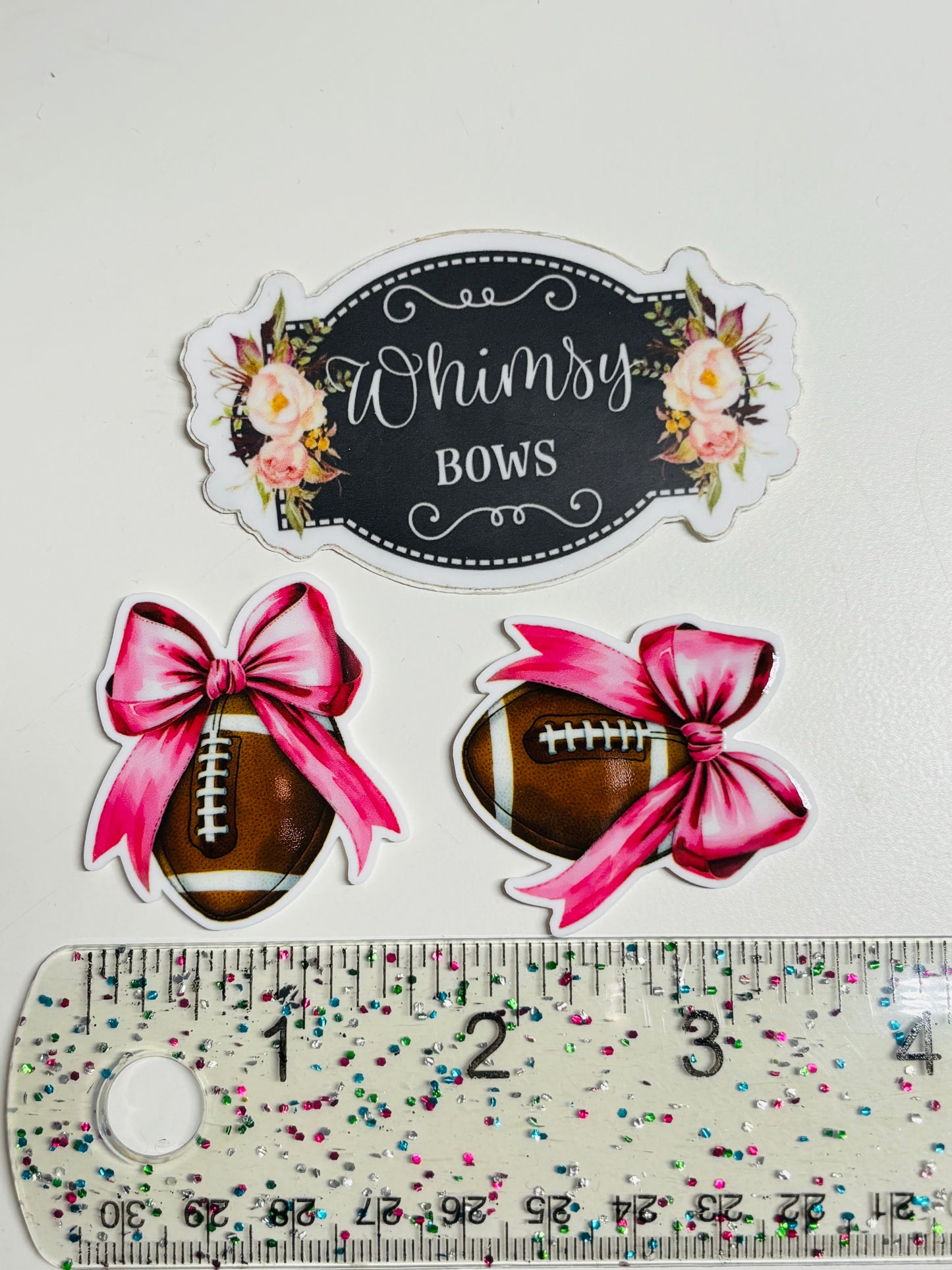 FOOTBALL PINK BOW RESIN SMALL