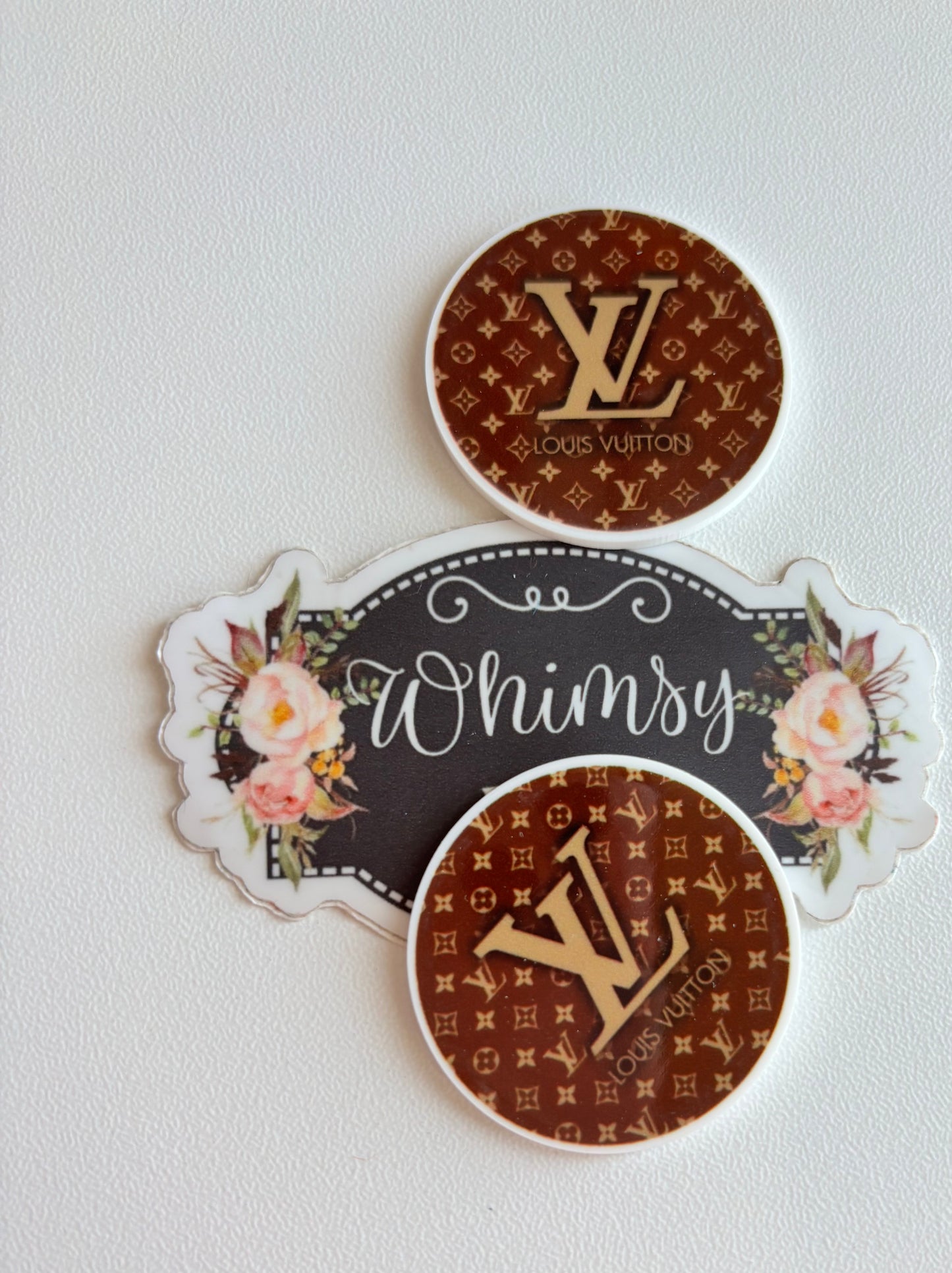 LV ROUND BROWN RESIN SMALL