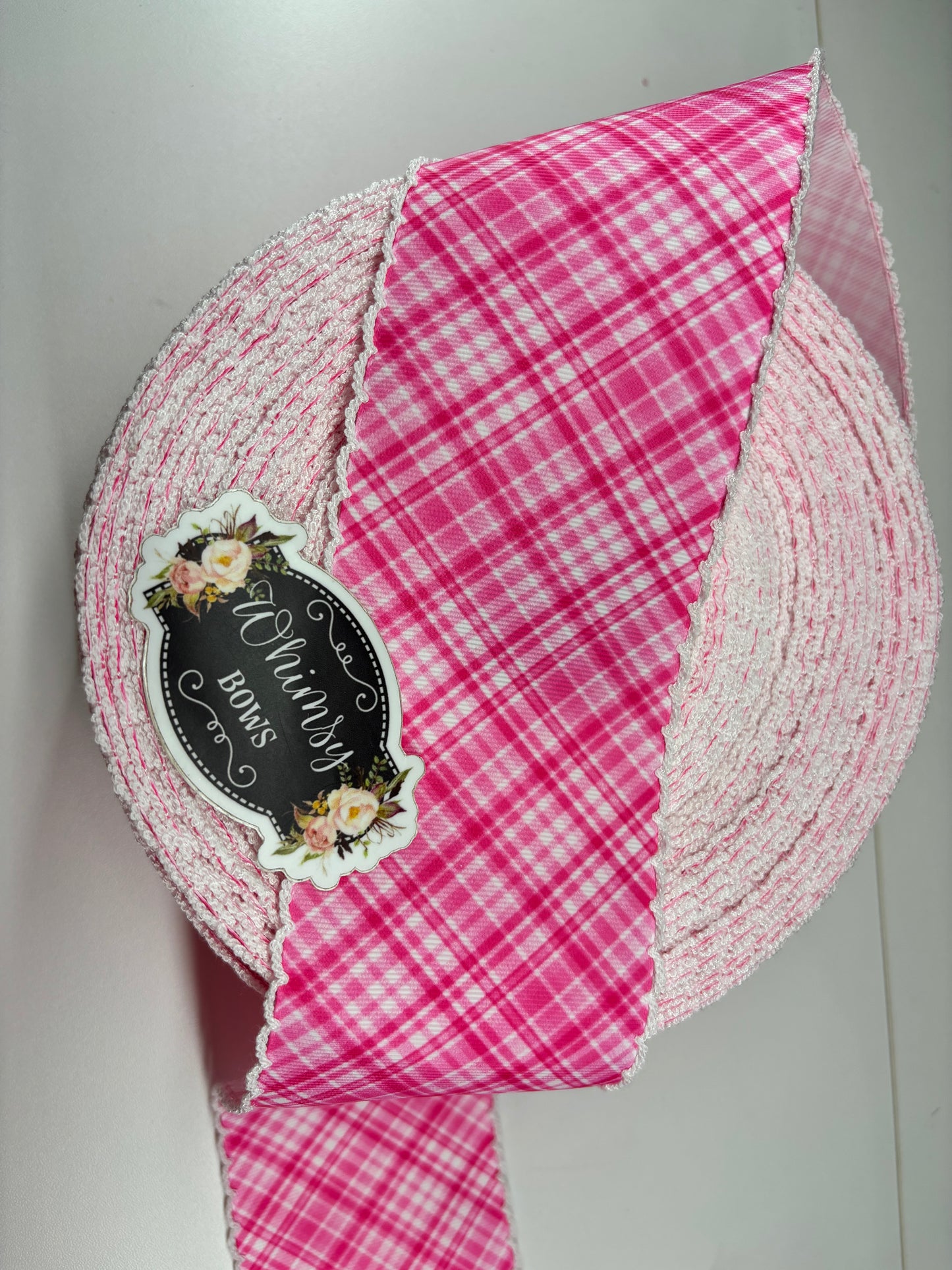 2 INCH PINK PLAID WITH WHITE STITCHING. MOONSTITCH RIBBON