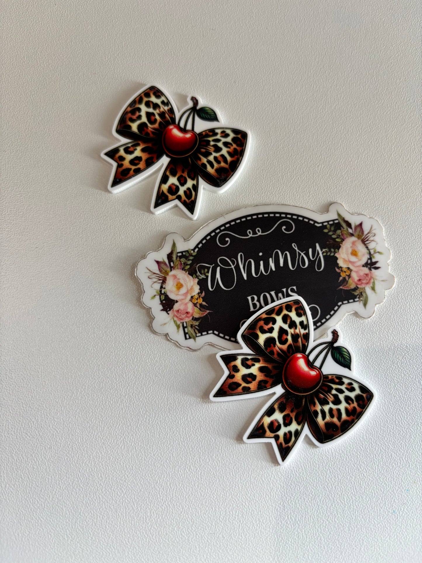 LEOPARD WITH CHERRIES BOW RESIN SMALL