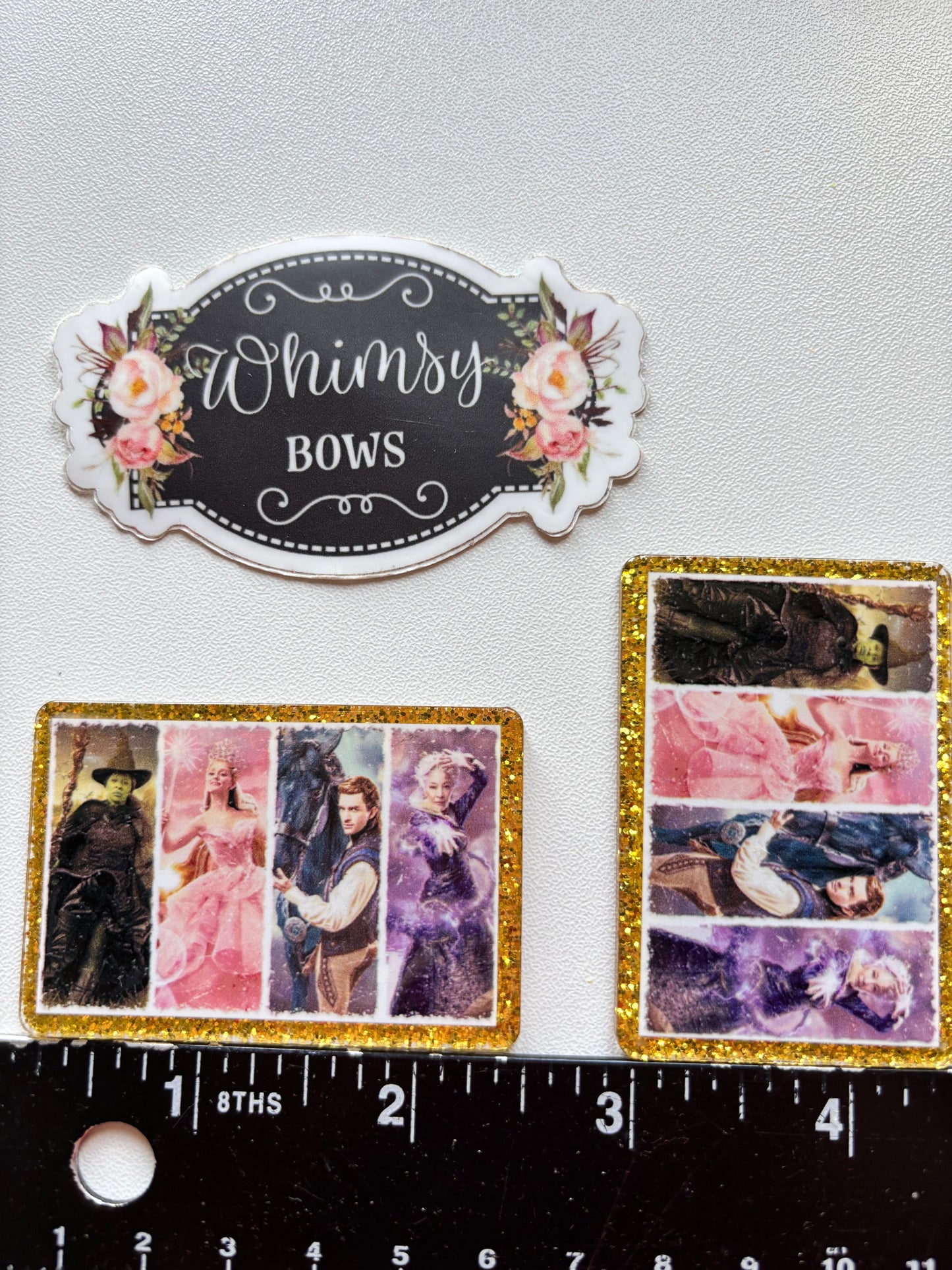 WICKED MOVIE GLINDA AND ELPHABA LARGE GLITTER RESIN