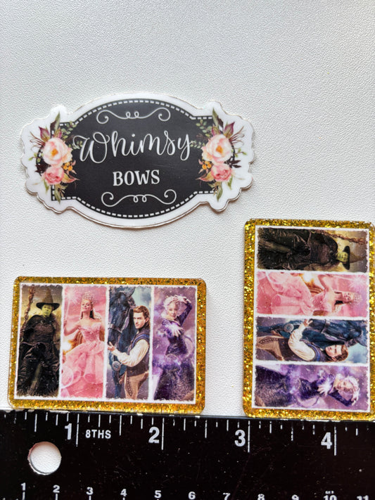 WICKED MOVIE GLINDA AND ELPHABA LARGE GLITTER RESIN