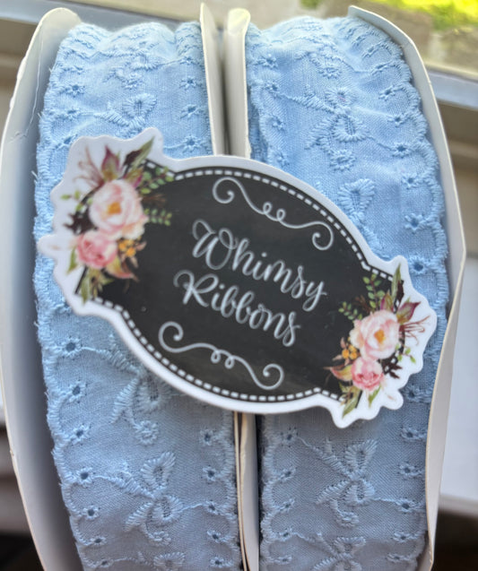 1.5 INCH light blue BOWS ON EYELET MATERIAL   -1YARD