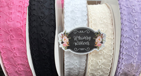 1.5 INCH BLACK BOWS ON EYELET MATERIAL   -RIBBON -1 yard