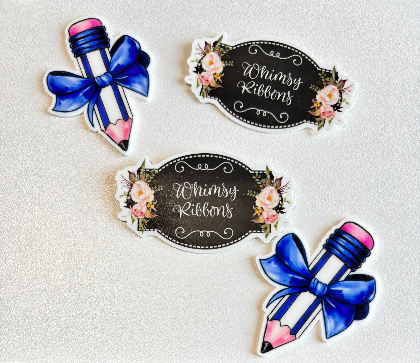BLUE PENCIL W BOW LARGE RESIN
