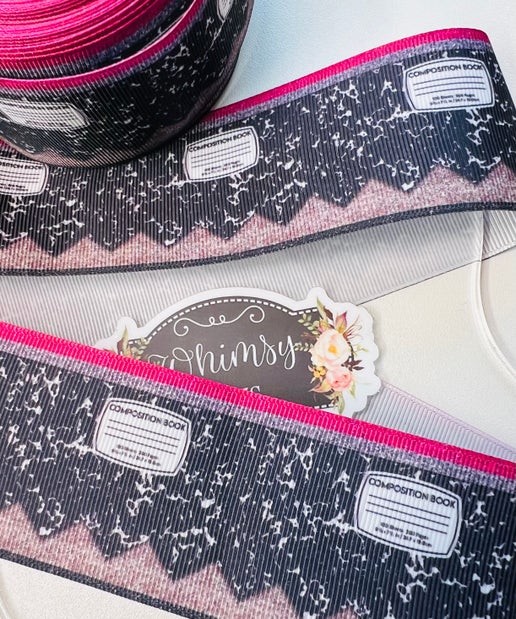 2 INCH COMPOSITION BOOK. BLACK   PRINTED GROSGRAIN RIBBON